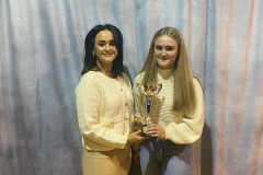 Amy McGinn receives her award (Sports Girl of the Year) by Mrs Deirdre Hackett